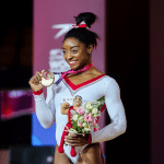 simone biles net worth medal